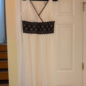 Chic White Dress with Black Lace Overlay